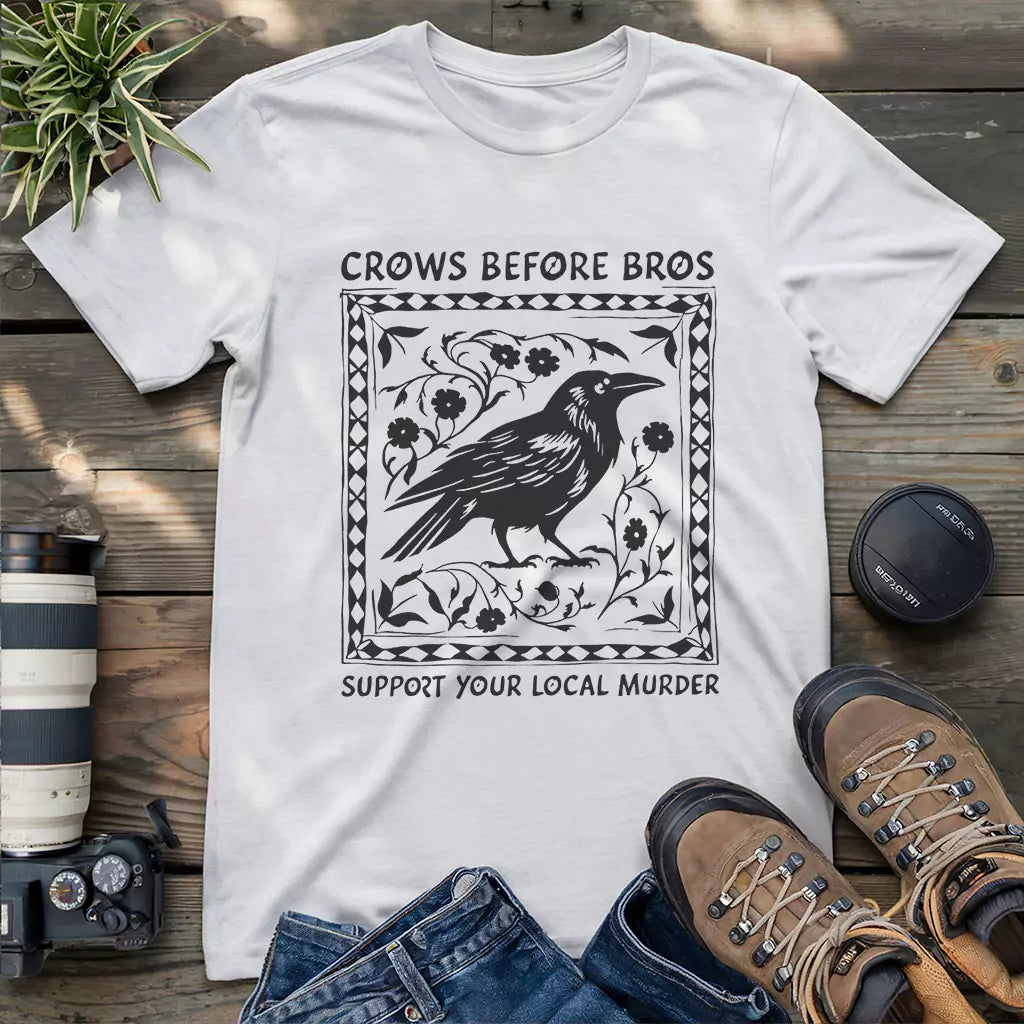 White unisex t-shirt with “Crows Before Bros” and floral framed crow illustration