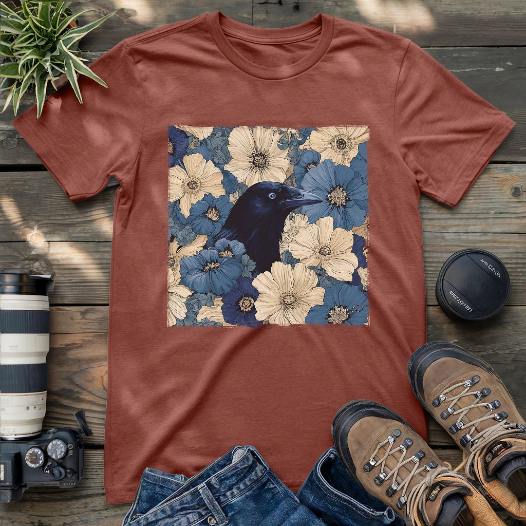 Raven surrounded by blue and cream flowers on mauve shirt