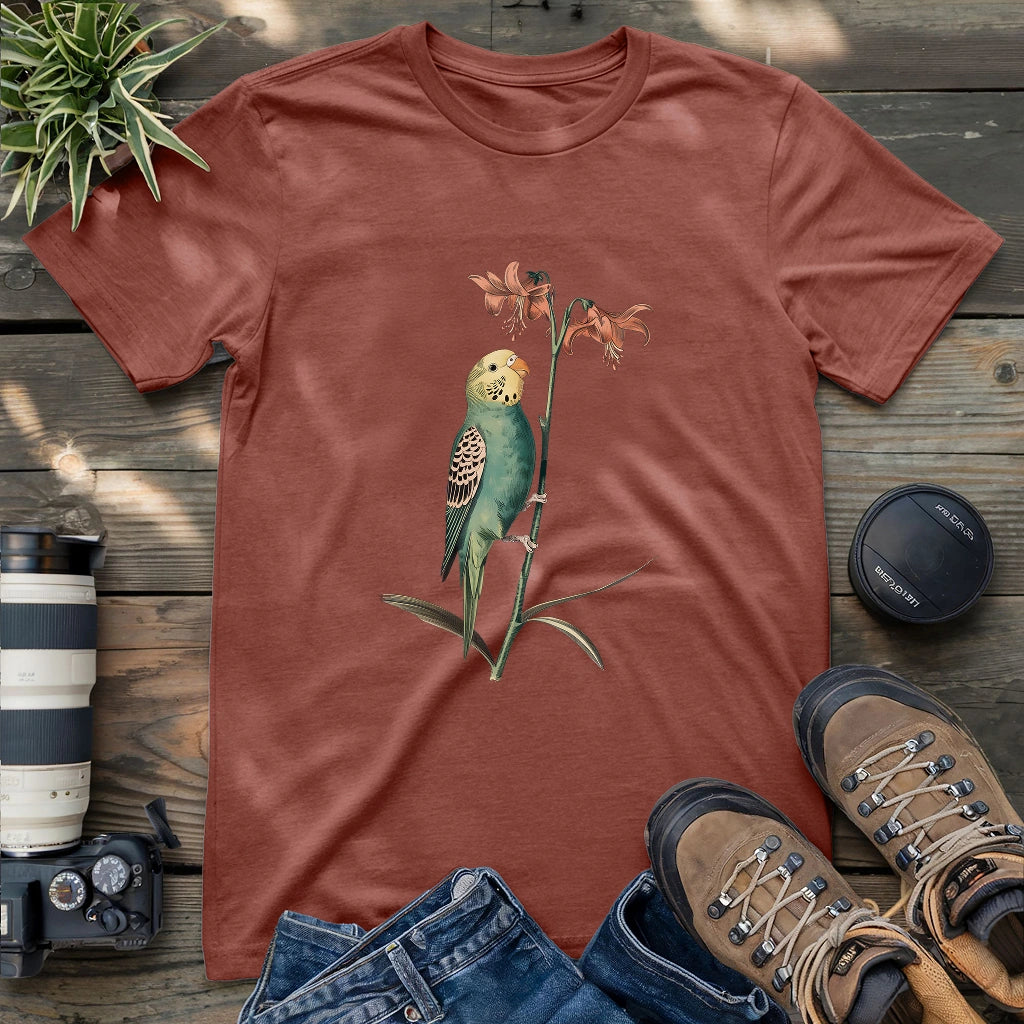 Beautiful budgerigar perching on lily shirt.