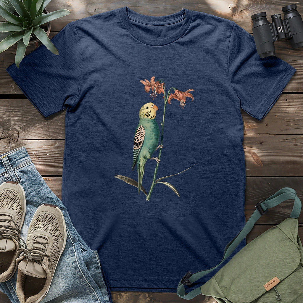 Beautiful budgerigar perching on lily shirt.