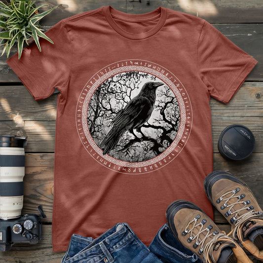 Heather mauve unisex t-shirt showcasing a raven illustration framed by Nordic runes, soft pastel gothic look.