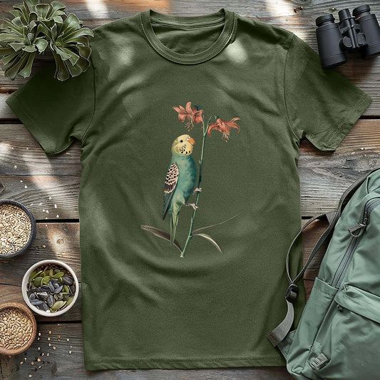 Beautiful budgerigar perching on lily shirt.